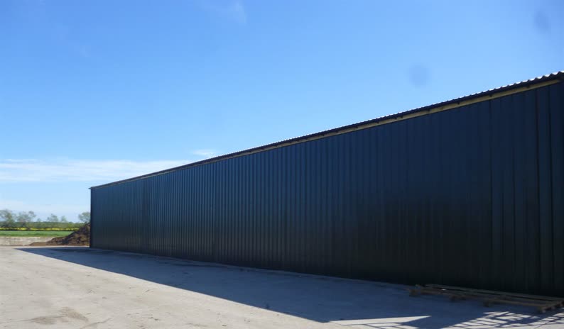 Re-roofing and re-cladding of an agricultural building at Whitemos, Formby